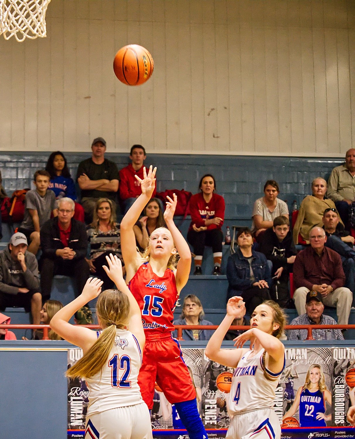 Bella Crawford (15) shoots a baseline shot for the Lady Panthers before Kynlee Love or Lindsey Hornaday can close out.